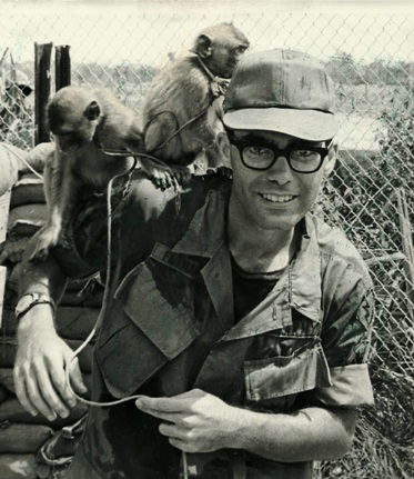 Ken Fairman in Vietnam with monkeys